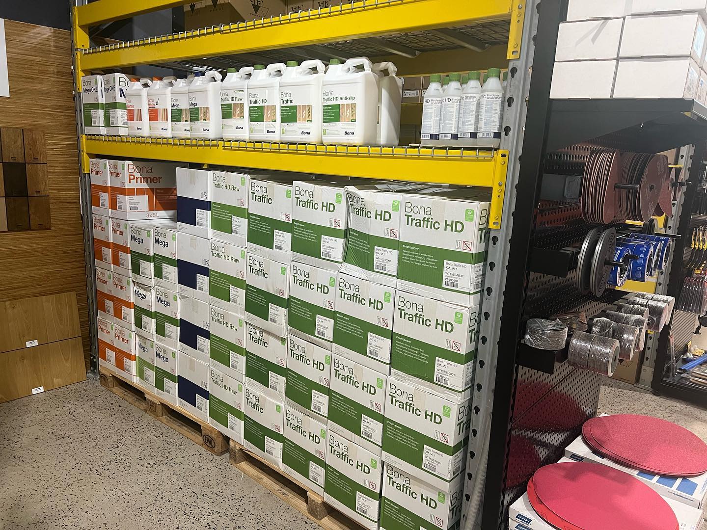 Bona primers and floor finishes on shelves at Sand-Aid